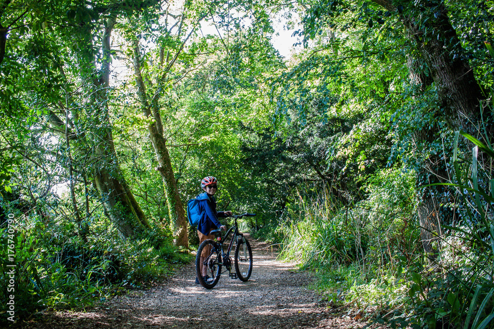 The boy is cycling The boy is cycling