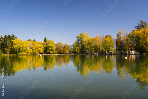Autumn colors and reflection on the Puigcerda's pond water