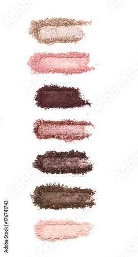 A smashed, neutral toned eyeshadow make up palette isolated on a white background