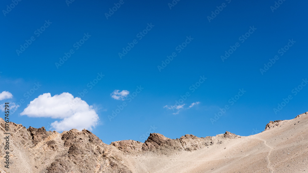 Closeup image of mountains and blue sky background in Ladakh , India