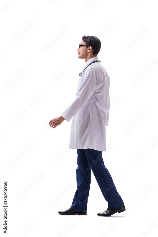 Young doctor physician standing walking isolated on white backgr Young doctor physician standing walking isolated on white backgr