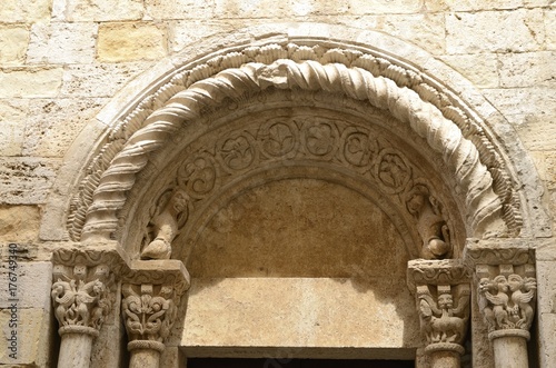 Stone arch of church in Besalu, Girona, Spain
