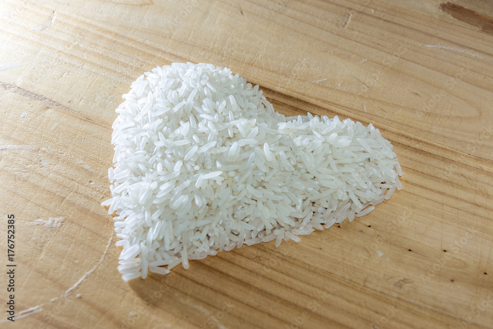 I love healthy food. Rice on a wooden background. I love healthy food. Rice on a wooden background.