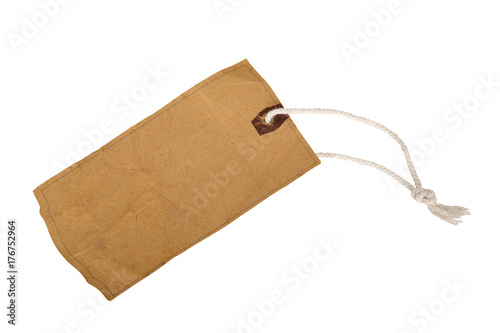 Rustic decorative cardboard paper gift tag with twine isolated on white background