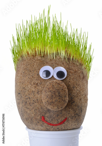 Head with grass on top