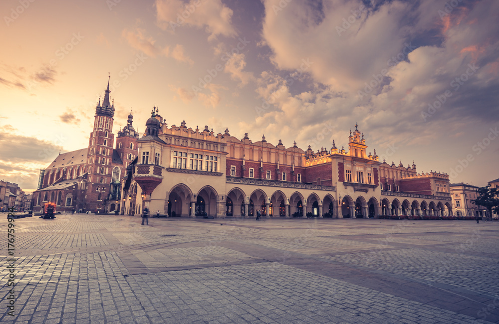 St Mary's church and cloth hall on Main Market Square in Krakow, colorful morning