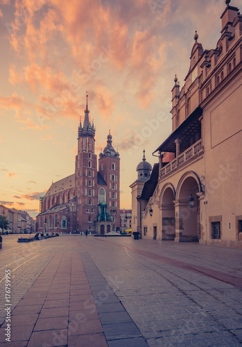 St Mary's church and Cloth Hall on Main Market Square in Krakow, on colorful morning © tomeyk