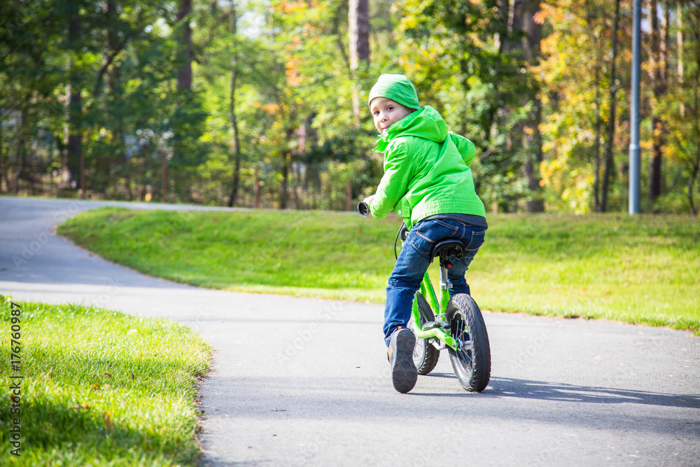 Boy riding a bicycle Boy riding a bicycle