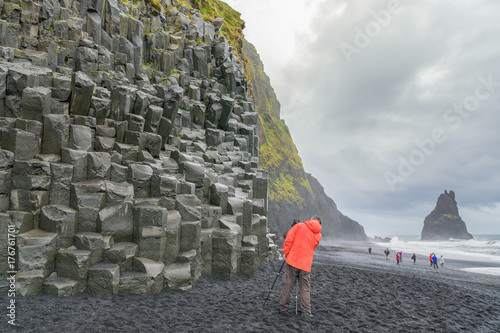 Basalt stacks of Reynisdrangur at Reynisfjara beach, Iceland photo