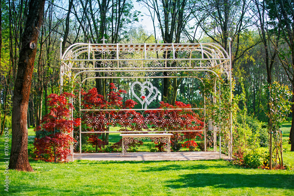 Wedding arch decorated in the garden Wedding arch decorated in the garden