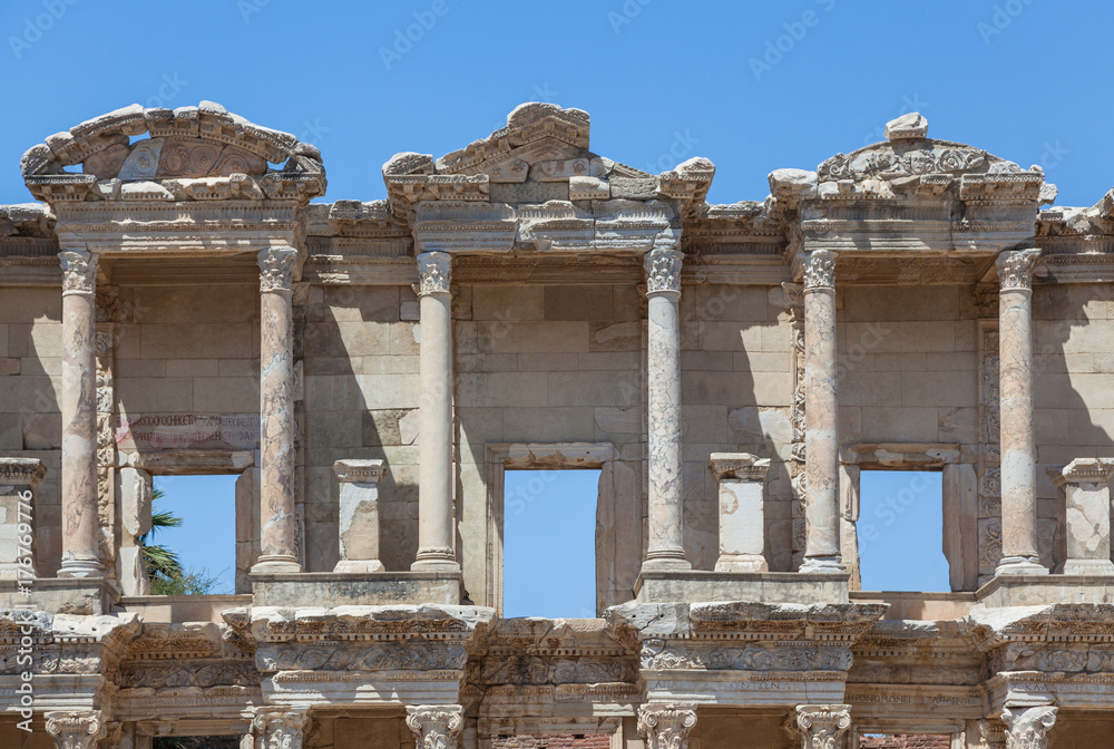 Top part of Facade of the Library of Celsus is an ancient Roman building in Ephesus, Turkey