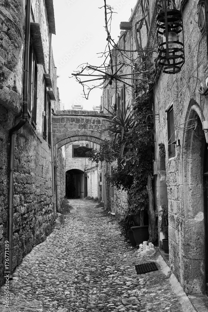 A small alley in Rhodes medieval town, Greece 