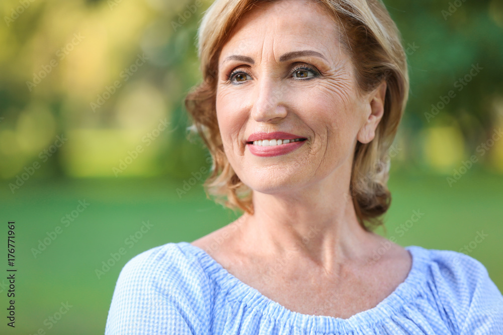 Portrait of beautiful mature woman outdoors Portrait of beautiful mature woman outdoors