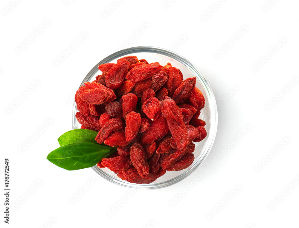 Bowl with red dried goji berries on white background Bowl with red dried goji berries on white background