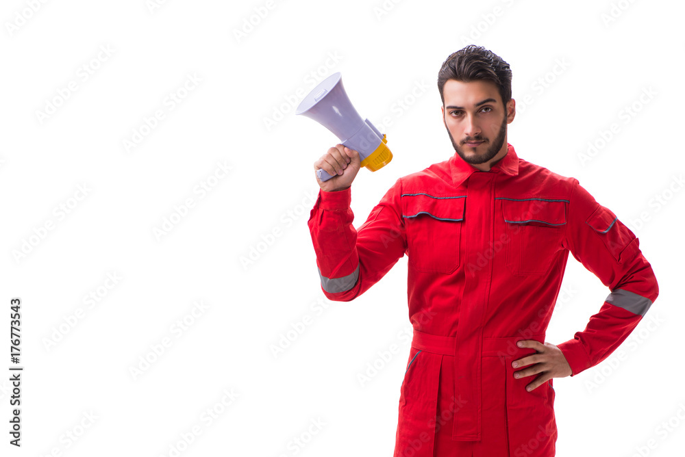 Young repairman with a megaphone bullhorn isolated on white back Young repairman with a megaphone bullhorn isolated on white back