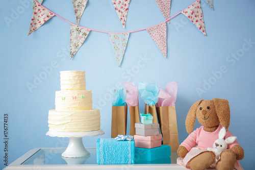 Baby shower gifts, cake and...