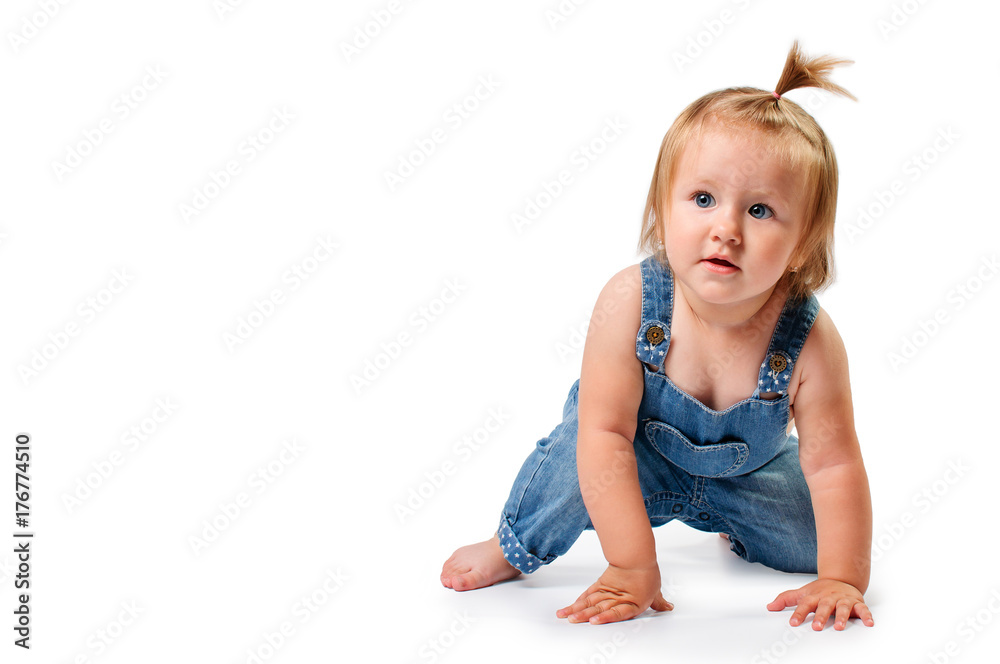 Cute little baby girl with happy face and funny haircut in jeans overalls on white background, isolated Cute little baby girl with happy face and funny haircut in jeans overalls on white background, isolated