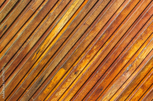 Diagonal brown old wooden planks  texture  background