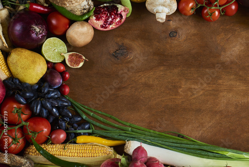 Fresh raw vegetables on wooden background copy space for text. Design moce up photo
