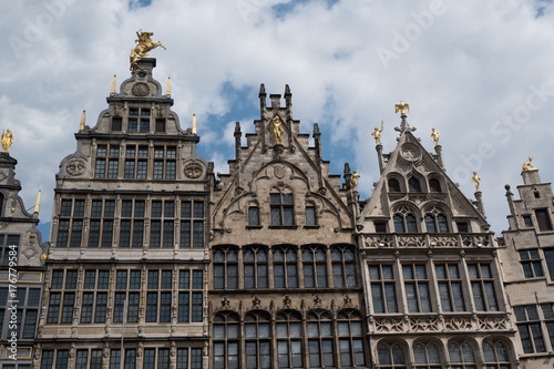 Vernacular Belgian architecture with Dutch stepped gables surrounding the Grote Markt in Antwerp, Belgium on a cloudy summer day.