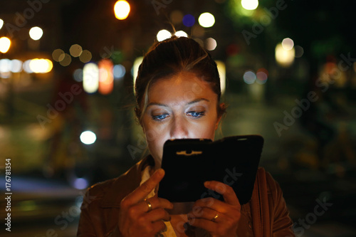 Woman looking smartphone