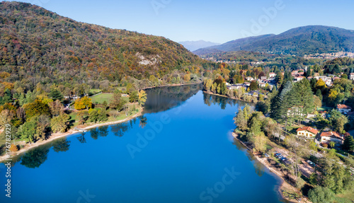 Landscape of Ghirla lake in autumn, aerial view. Province of Varese, Italy © EleSi