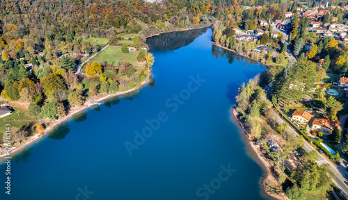 Landscape of Ghirla lake in autumn, aerial view. Province of Varese, Italy
