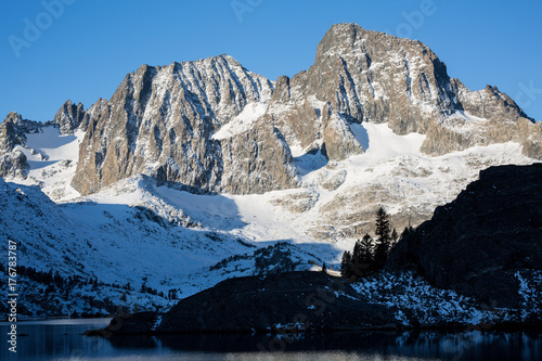 Sunrise on Banner Peak above Garnet Lake in the Ansel Adams wilderness after a fresh snow photo