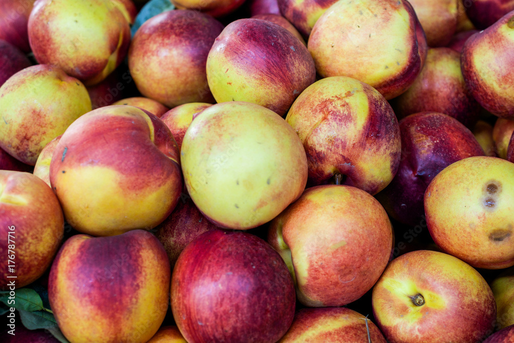 A group of nectarines - background or backdrop A group of nectarines - background or backdrop