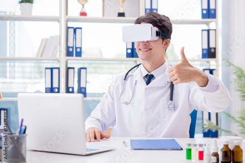 Doctor working with virtual VR reality glasses