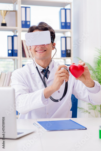 Doctor working with virtual VR reality glasses © Elnur
