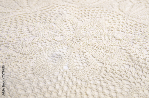 Closeup beautiful handmade crochet lace, floral pattern 