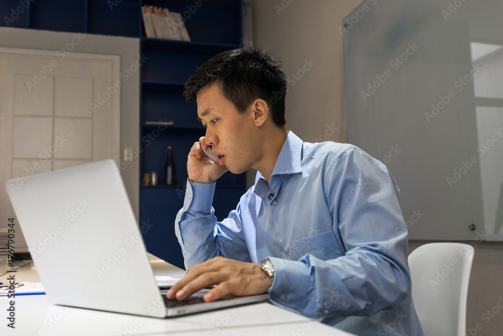Young business employee discuss with colleague on cellphone Young business employee discuss with colleague on cellphone