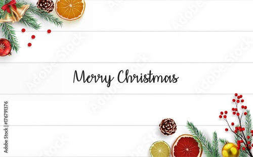 Christmas wooden background with fir branches and golden bells