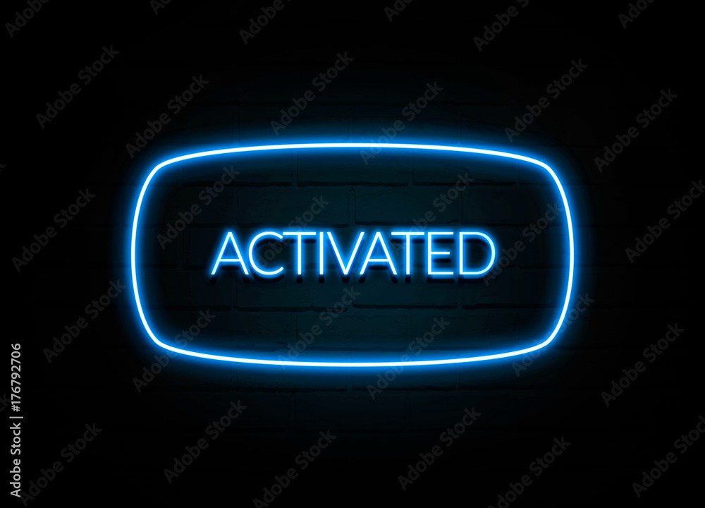 Activated - colorful Neon Sign on brickwall Activated - colorful Neon Sign on brickwall