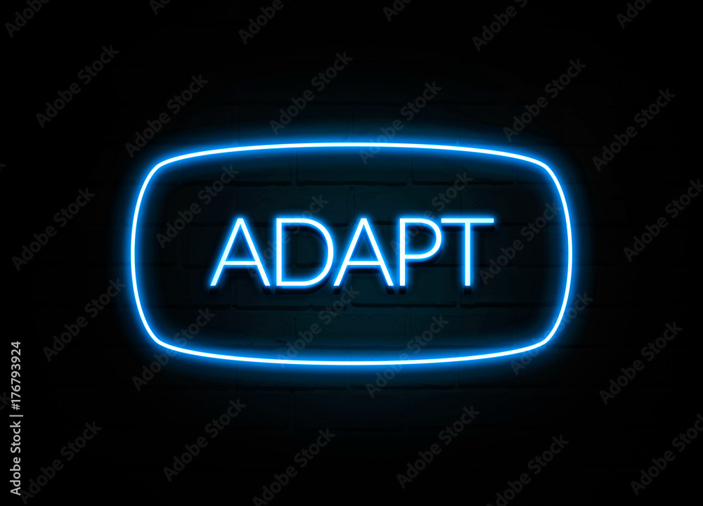 Adapt - colorful Neon Sign on brickwall Adapt - colorful Neon Sign on brickwall