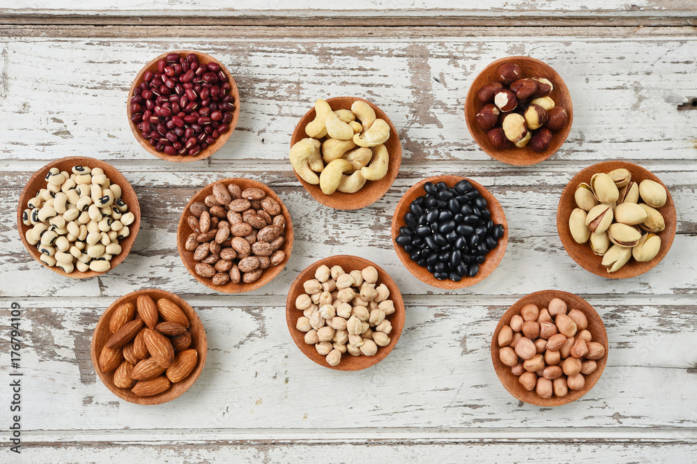 collection of different legumes in wooden bowl collection of different legumes in wooden bowl