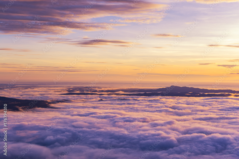 Sunrise and Sea of fog at pah nok ann at Phu Kradueng National Park , Loei Thailand Sunrise and Sea of fog at pah nok ann at Phu Kradueng National Park , Loei Thailand
