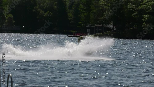 seadoo big jump on the wake behind boat 4k photo