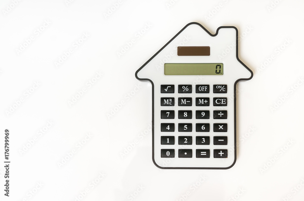 Calculator on white - real estate, lease and mortgage concept Calculator on white - real estate, lease and mortgage concept