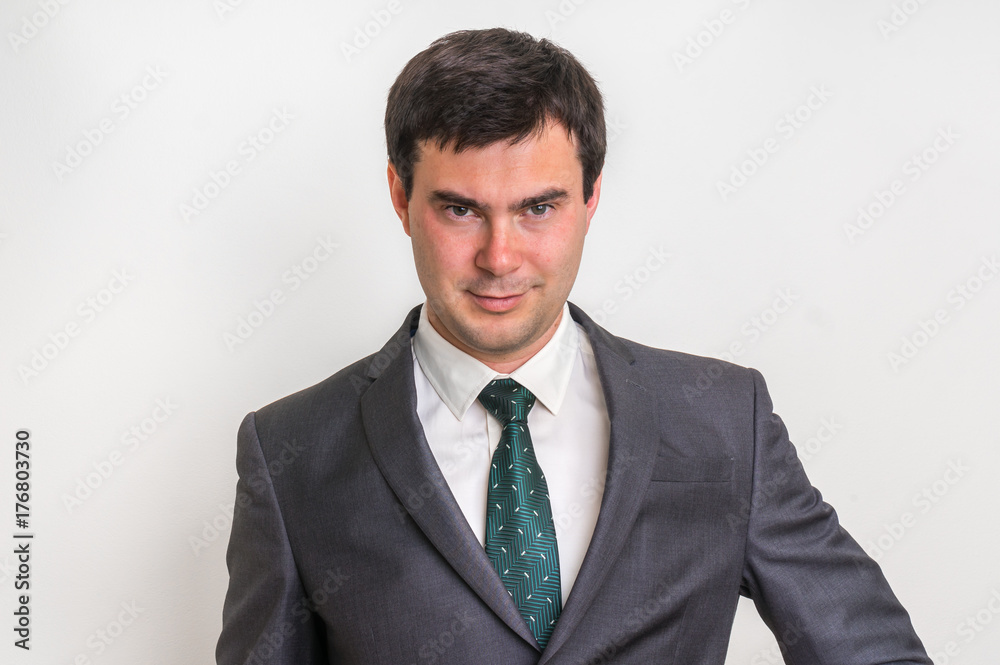 Portrait of successful businessman in suit isolated on white Portrait of successful businessman in suit isolated on white