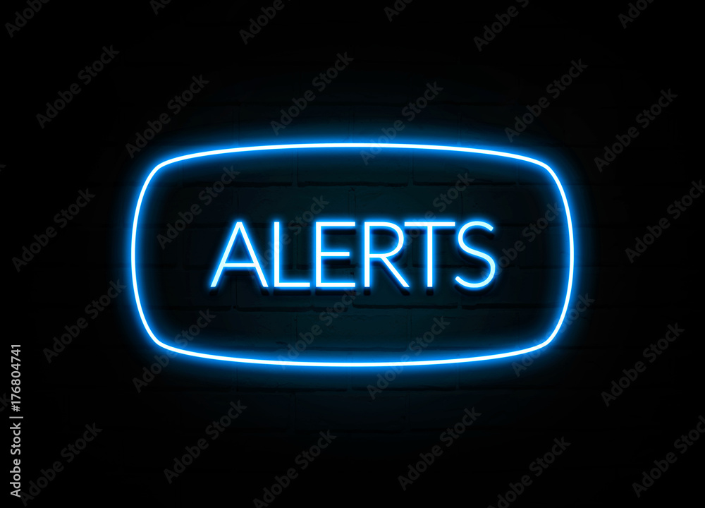 Alerts - colorful Neon Sign on brickwall Alerts - colorful Neon Sign on brickwall