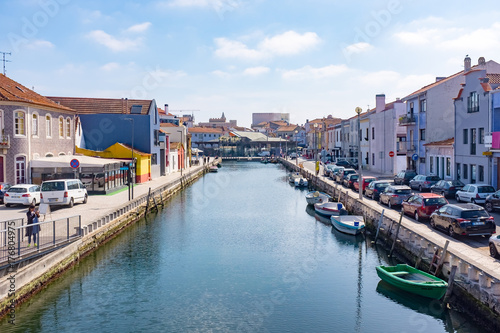 Traditional colourd boats on the canal in Aveiro, Portugal photo