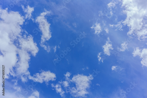 Beautiful white clouds and blue sky background