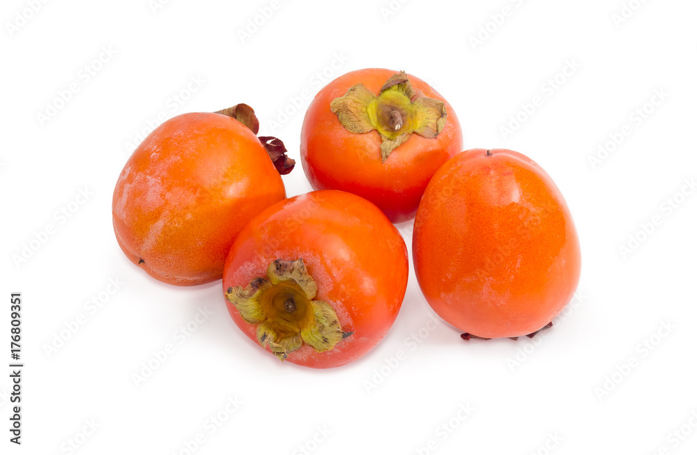 Several persimmons on a white background Several persimmons on a white background