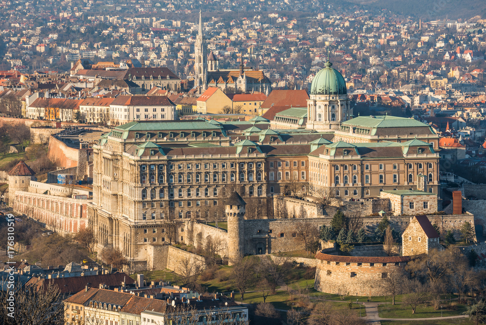 Obraz premium Buda Castle or Royal Palace in Budapest, Hungary Lit by Setting Sun
