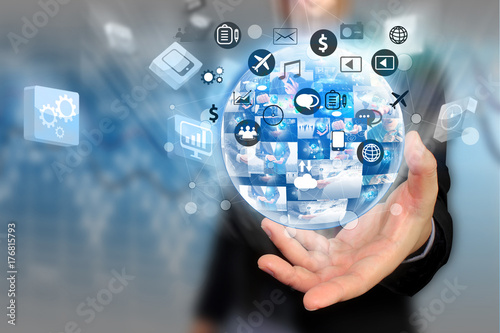 Businessman holding social media concept.