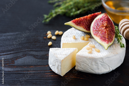 White cheese brie or camambert, figs, honey and nuts