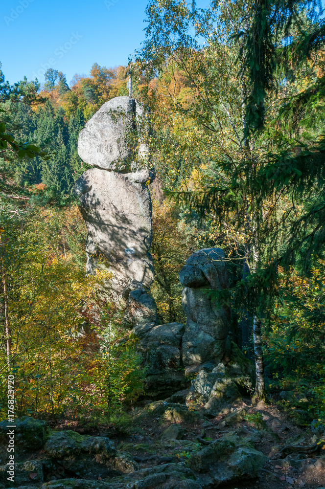 natural stone column in the forest - peak of Kerzenstein in Austria natural stone column in the forest - peak of Kerzenstein in Austria