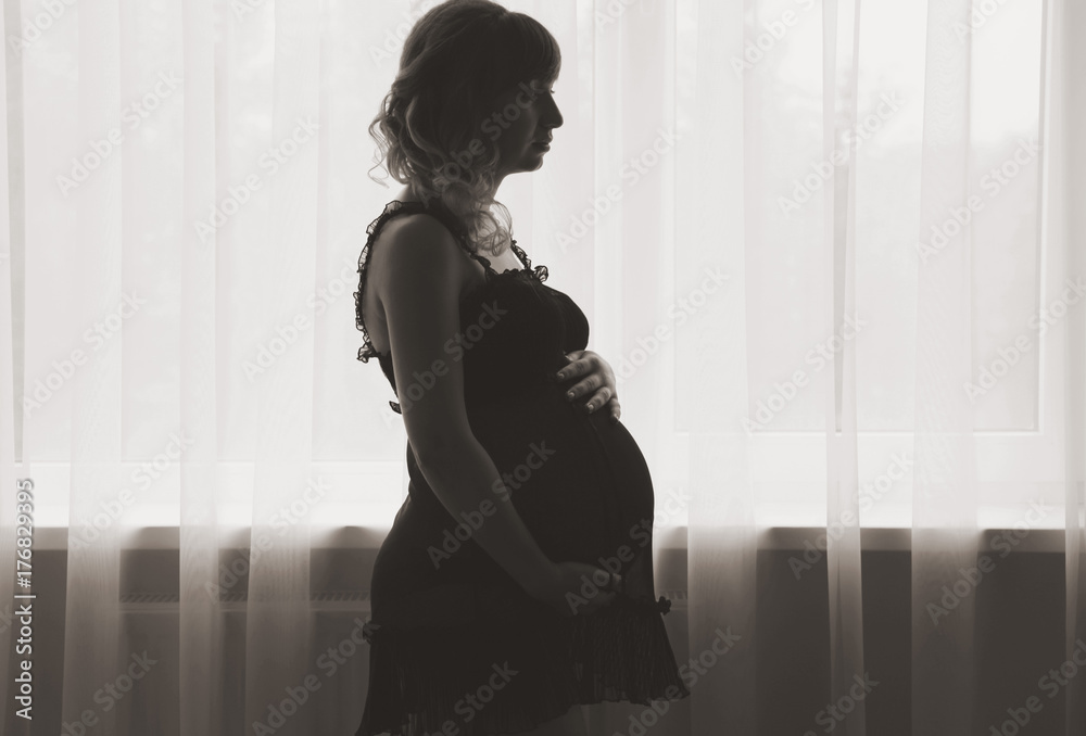 Silhouette of a  pregnant woman